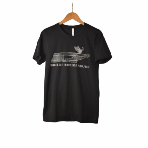 Black Tennessee Innocence Project distressed logo t-shirt on a wooden hanger