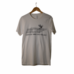 White Tennessee Innocence Project distressed logo t-shirt on a wooden hanger
