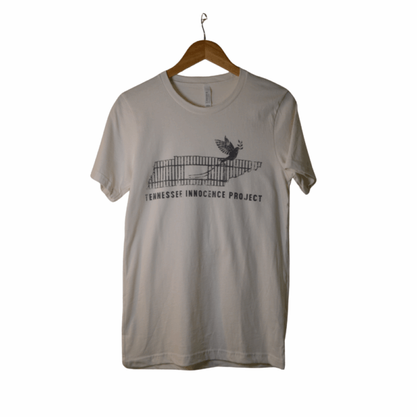 White Tennessee Innocence Project distressed logo t-shirt on a wooden hanger